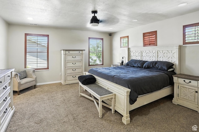 1061 N Bellingham Ct W, North Salt Lake, UT 84054 - bedroom with multiple windows, recessed lighting, light carpet, a textured ceiling, and ceiling fan