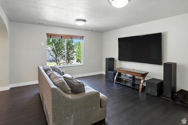 1061 N Bellingham Ct W, North Salt Lake, UT 84054 - living room with wood finished floors, arched walkways, and a textured ceiling