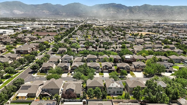 1061 N Bellingham Ct W, North Salt Lake, UT 84054 - aerial perspective of suburban area with a mountainous background