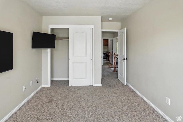 1061 N Bellingham Ct W, North Salt Lake, UT 84054 - unfurnished bedroom with carpet floors, washer / dryer, and a closet
