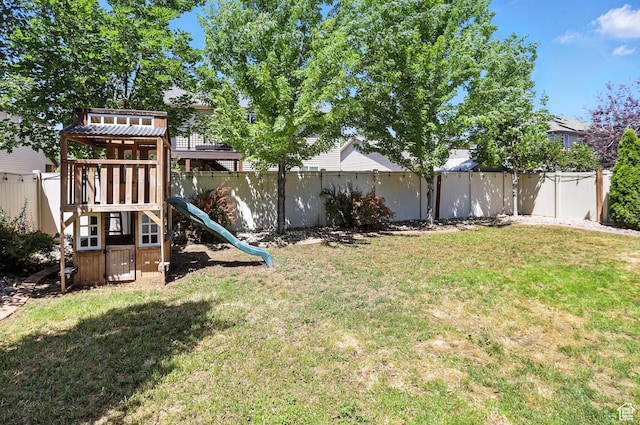 1061 N Bellingham Ct W, North Salt Lake, UT 84054 - fenced backyard featuring a playground