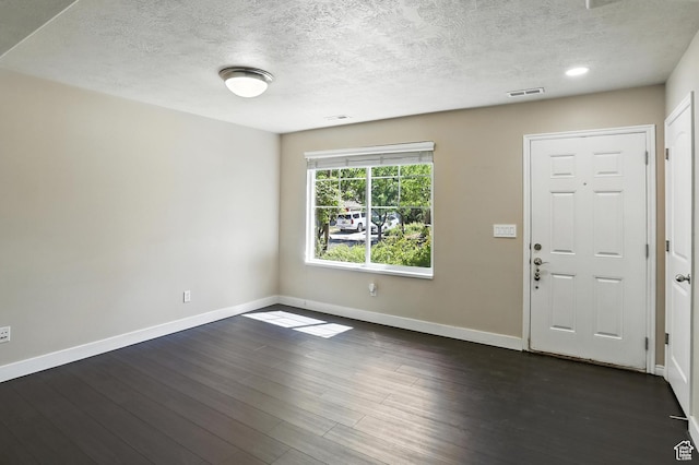 1061 N Bellingham Ct W, North Salt Lake, UT 84054 - entryway featuring a textured ceiling and dark wood-style floors