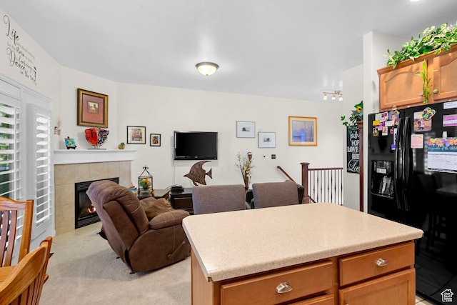 14857 S Treseder St, Draper, UT 84020 - living area featuring light colored carpet and a tile fireplace