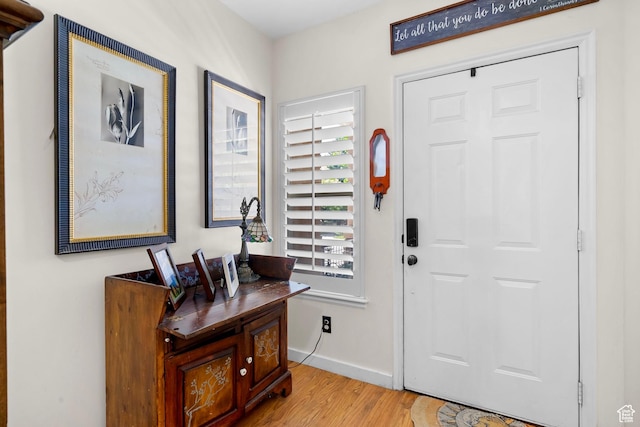 14857 S Treseder St, Draper, UT 84020 - foyer entrance with wood finished floors and baseboards