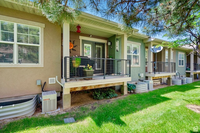 14857 S Treseder St, Draper, UT 84020 - property entrance with stucco siding, a yard, and a porch