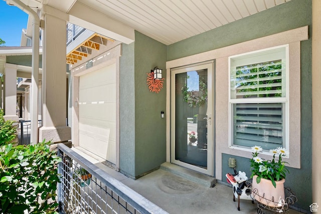 14857 S Treseder St, Draper, UT 84020 - entrance to property with stucco siding and a garage