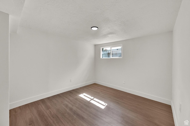 468 W 2400 S, Bountiful, UT 84010 - unfurnished room with wood finished floors and a textured ceiling