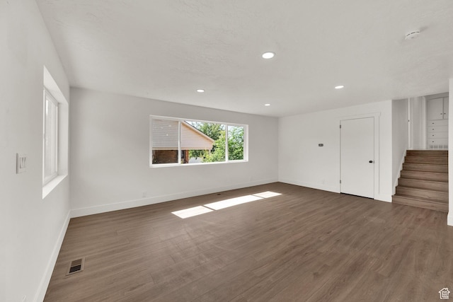 468 W 2400 S, Bountiful, UT 84010 - unfurnished living room with wood finished floors, stairway, and recessed lighting