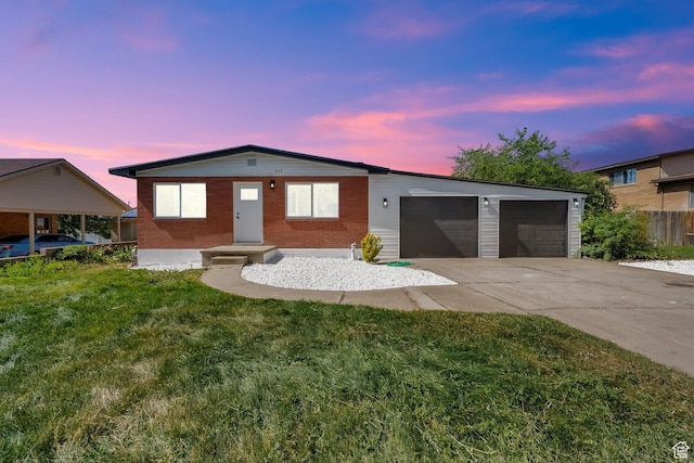 468 W 2400 S, Bountiful, UT 84010 - ranch-style house with concrete driveway, a yard, and a garage