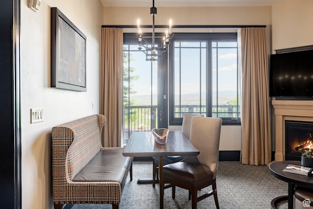 2100 W Frostwood Blvd Unit 3164, Park City, UT 84098 - carpeted dining space with a chandelier, healthy amount of natural light, and a lit fireplace