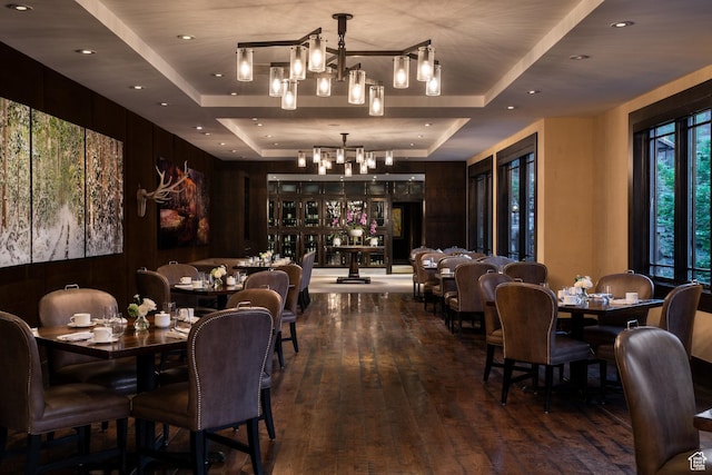 2100 W Frostwood Blvd Unit 3164, Park City, UT 84098 - dining area featuring a tray ceiling, dark wood-style floors, a chandelier, and recessed lighting