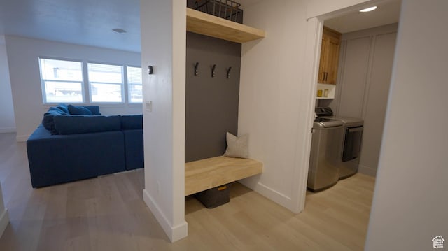 744 N 540 E, Smithfield, UT 84335 - mudroom featuring light wood-style flooring and washing machine and dryer