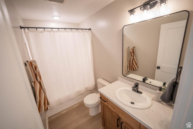 744 N 540 E, Smithfield, UT 84335 - bathroom featuring wood finished floors, vanity, and shower / tub combo with curtain