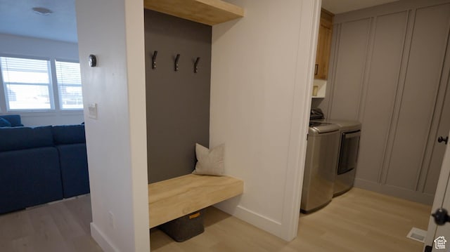 744 N 540 E, Smithfield, UT 84335 - mudroom featuring light wood-style flooring and washing machine and clothes dryer