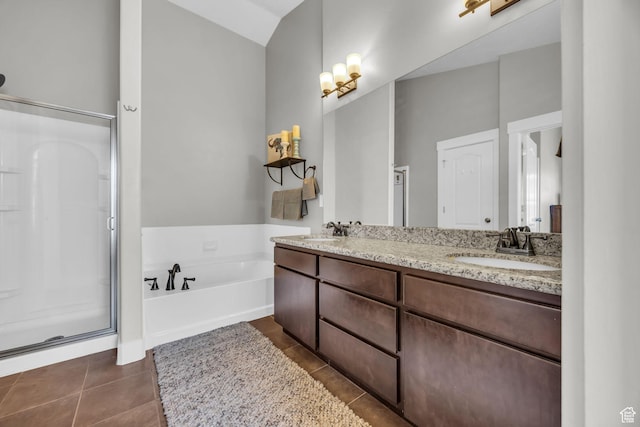 169 W Barry Links Way S, Salt Lake, UT 84115 - bathroom with a shower stall, a bath, double vanity, and tile patterned floors
