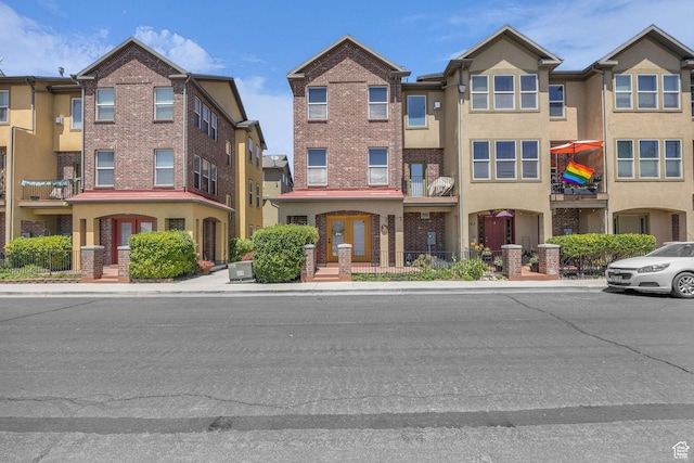 169 W Barry Links Way S, Salt Lake, UT 84115 - view of front facade with brick siding and stucco siding
