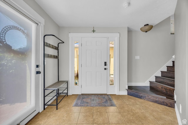 169 W Barry Links Way S, Salt Lake, UT 84115 - tiled entryway with stairway and baseboards