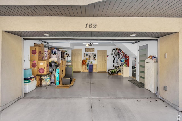 169 W Barry Links Way S, Salt Lake, UT 84115 - garage featuring a garage door opener