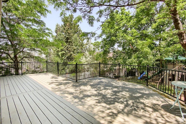 2839 S Oakwood Dr, Bountiful, UT 84010 - wooden deck with a playground