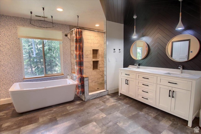 2839 S Oakwood Dr, Bountiful, UT 84010 - full bathroom featuring a stall shower, a freestanding bath, double vanity, and recessed lighting