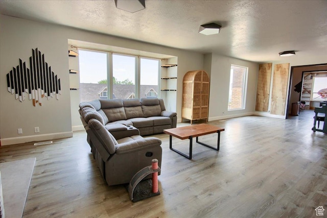 2839 S Oakwood Dr, Bountiful, UT 84010 - living room featuring wood finished floors and a textured ceiling