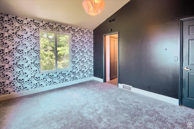 2839 S Oakwood Dr, Bountiful, UT 84010 - carpeted spare room with wallpapered walls and lofted ceiling