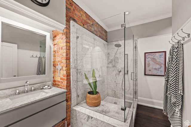 557 E 1 St Ave Unit 12, Salt Lake City, UT 84103 - bathroom with a shower stall, vanity, ornamental molding, and wood finished floors