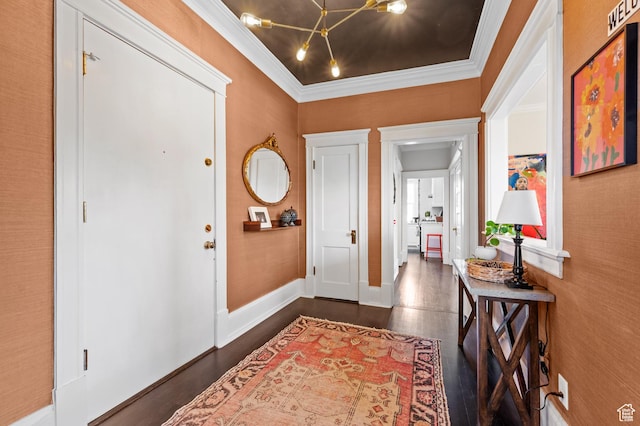557 E 1 St Ave Unit 12, Salt Lake City, UT 84103 - entryway with ornamental molding, dark wood-type flooring, and a chandelier
