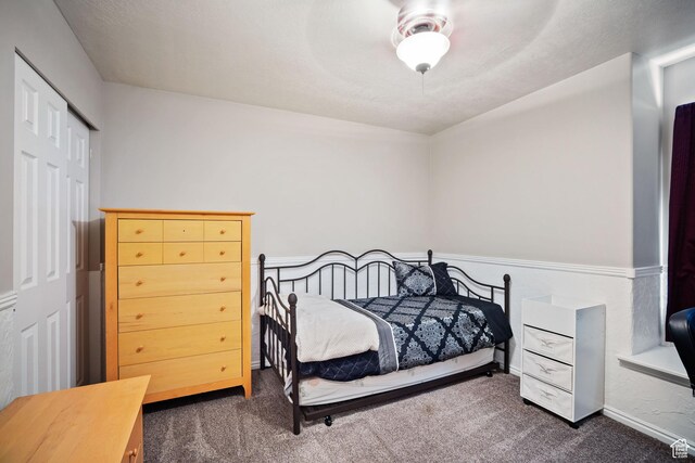 452 N Kent Dr, North Salt Lake, UT 84054 - bedroom featuring carpet, a closet, and ceiling fan