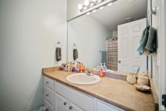 452 N Kent Dr, North Salt Lake, UT 84054 - bathroom with vanity and a shower with shower curtain