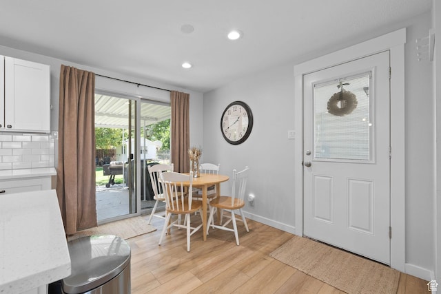440 E Willow Ave, Murray, UT 84107 - dining area featuring light wood-style floors and recessed lighting