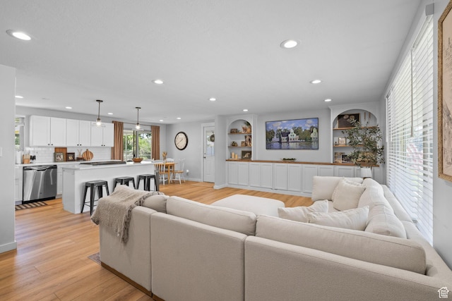 440 E Willow Ave, Murray, UT 84107 - living area featuring recessed lighting, light wood-type flooring, and built in shelves