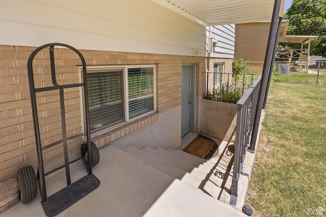 440 E Willow Ave, Murray, UT 84107 - doorway to property featuring brick siding