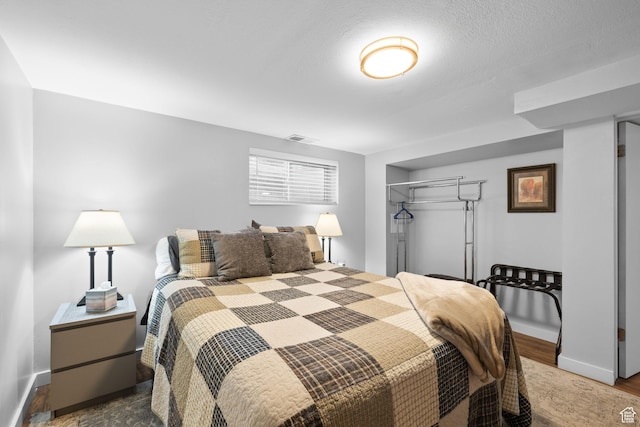 440 E Willow Ave, Murray, UT 84107 - bedroom featuring a closet and wood finished floors