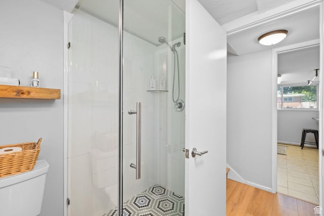440 E Willow Ave, Murray, UT 84107 - bathroom featuring a shower stall and wood finished floors