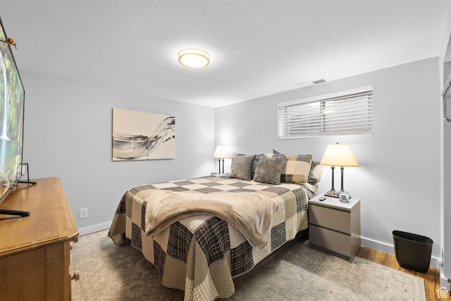 440 E Willow Ave, Murray, UT 84107 - bedroom featuring baseboards and wood finished floors