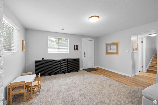 440 E Willow Ave, Murray, UT 84107 - entrance foyer featuring wood finished floors and stairs