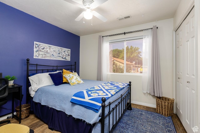 2403 S 725 W, Hurricane, UT 84737 - bedroom with wood finished floors, a closet, and ceiling fan