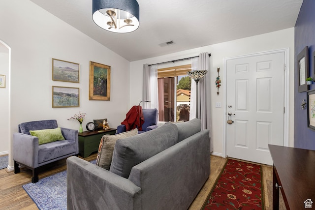 2403 S 725 W, Hurricane, UT 84737 - living room featuring vaulted ceiling and light wood finished floors