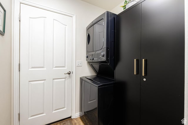 2403 S 725 W, Hurricane, UT 84737 - washroom with stacked washer / dryer and wood finished floors