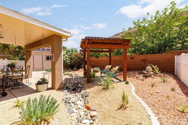 2403 S 725 W, Hurricane, UT 84737 - fenced backyard featuring a patio, a storage shed, and a pergola