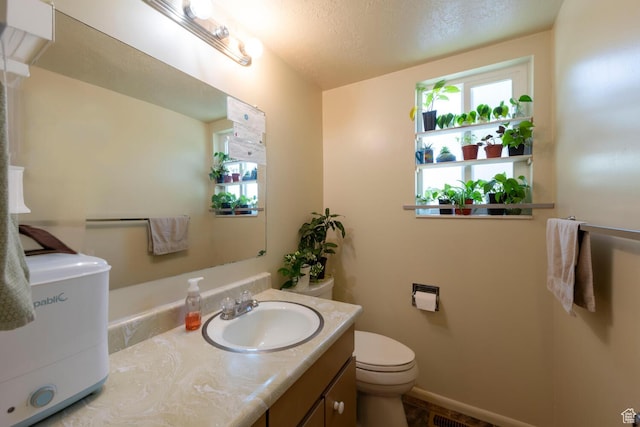 1949 E Jeremy Dr S, Salt Lake City, UT 84121 - bathroom featuring vanity and a textured ceiling