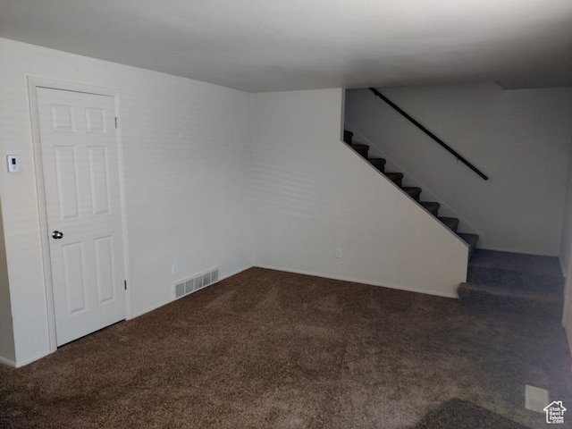 1949 E Jeremy Dr S, Salt Lake City, UT 84121 - below grade area with carpet flooring and stairway