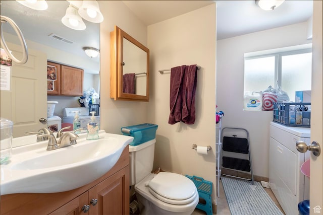 1949 E Jeremy Dr S, Salt Lake City, UT 84121 - bathroom with vanity and washer / dryer