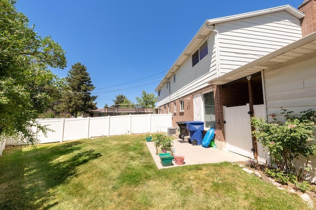 1949 E Jeremy Dr S, Salt Lake City, UT 84121 - view of yard featuring a patio
