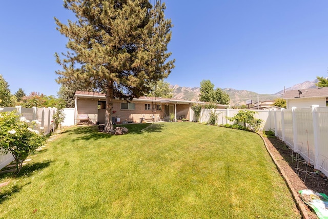 6204 S Jeremy Cir, Salt Lake City, UT 84121 - fenced backyard featuring a mountain view