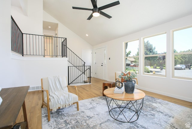 522 W 1060 N, Clinton, UT 84015 - living room with vaulted ceiling, ceiling fan, healthy amount of natural light, wood finished floors, and recessed lighting