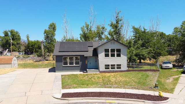 522 W 1060 N, Clinton, UT 84015 - view of front of home featuring solar panels and a shingled roof