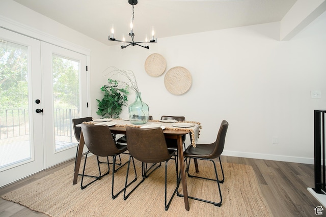 522 W 1060 N, Clinton, UT 84015 - dining room with a chandelier, french doors, and wood finished floors