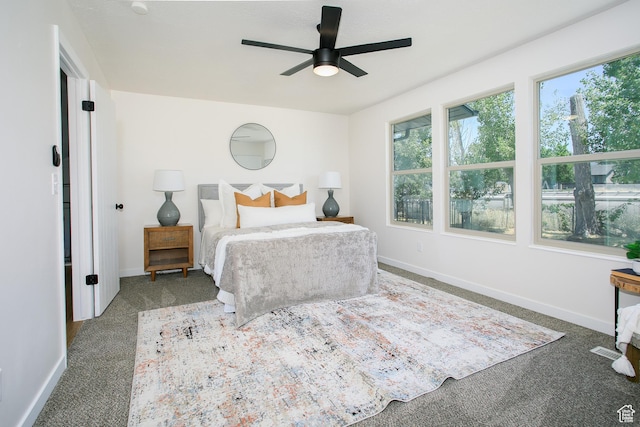 522 W 1060 N, Clinton, UT 84015 - carpeted bedroom with multiple windows and a ceiling fan